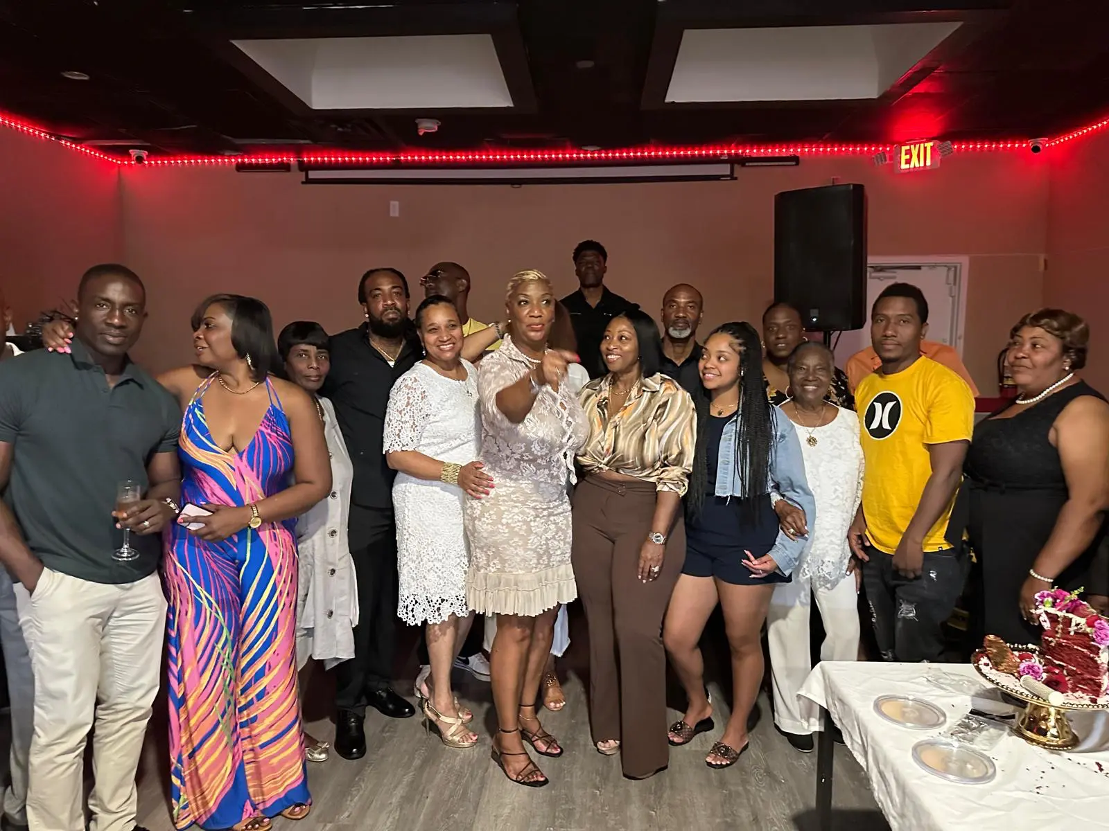 A group of travelers celebrating together at an evening dinner